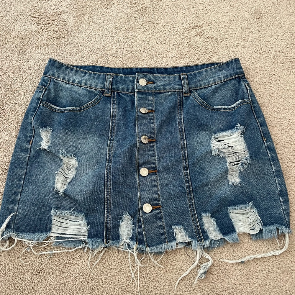 Denim Ripped Mini skirt.